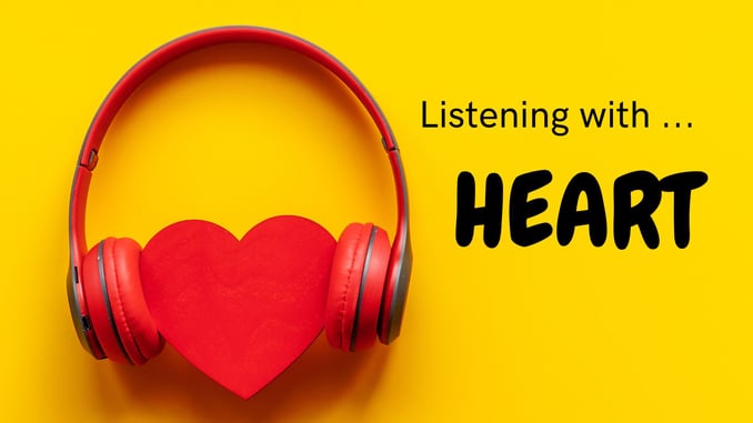 red heart listening with red headphones, listening with heart